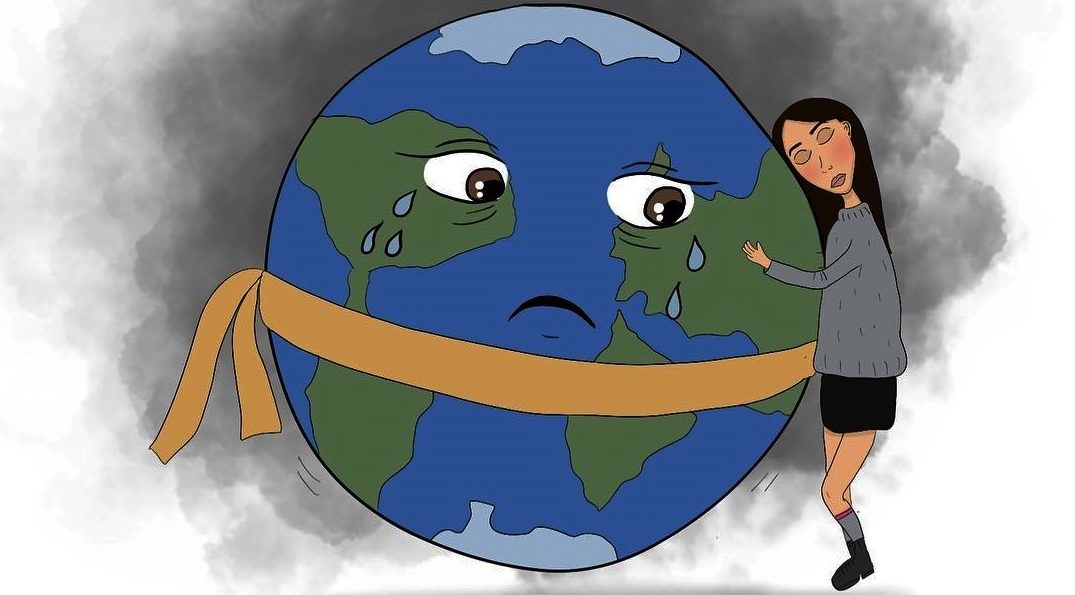 Tekst o artystach podnoszących świadomość ekologiczną przez ilustracje. Na zdjęciu: Rysunek kobiety tuliącej smutną planetę - HelloZdrowie